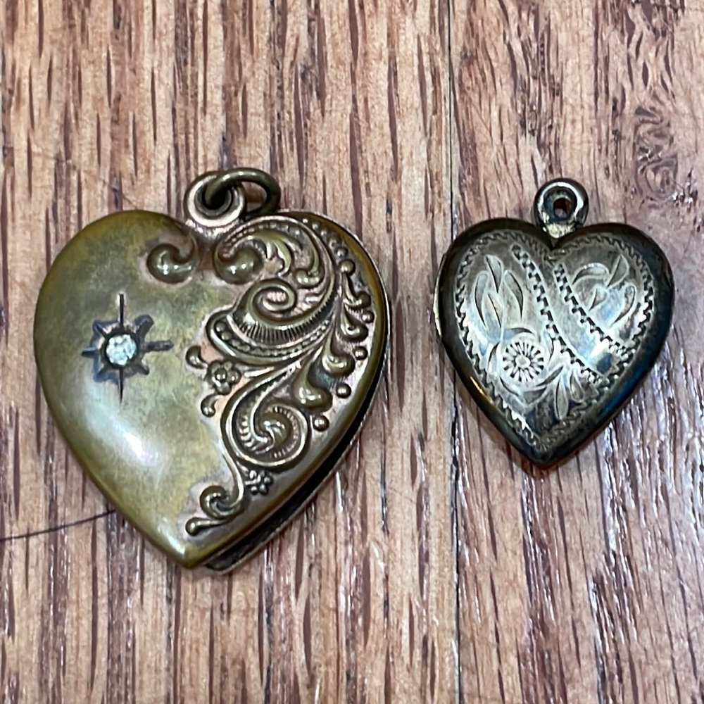 Two heart shaped lockets
